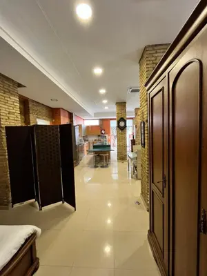 a room with a hallway with a bed and a kitchen at IY Loft 5 - Spacious Loft in the Old Town in Valencia
