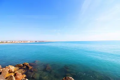 a view of a large body of water at Global Vacacional, Práctico apartamento en Puerto de Sagunto cerca de la playa in Puerto de Sagunto