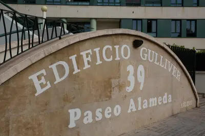 a sign for the paseo alhambra in front of a building at SingularStays Alameda II in Valencia
