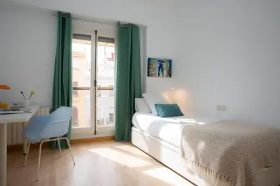 a wooden door with the number on it at SingularStays Reina II in Valencia
