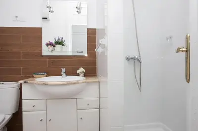 a bathroom with a sink and a shower at SingularStays SEU V in Valencia