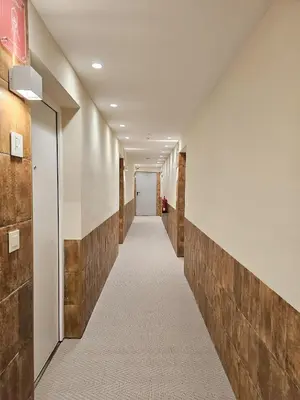 a corridor of a hallway with a long hallway at Apartamentos Las Ciencias Studio X in Valencia