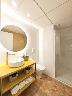a bathroom with a sink and a shower at Apartamentos Las Ciencias Studio T in Valencia