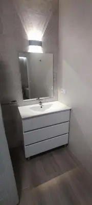 a bathroom with a white sink and a mirror at Estudio diseño cerca Ciudad Ciencias VT-55211-V in Valencia