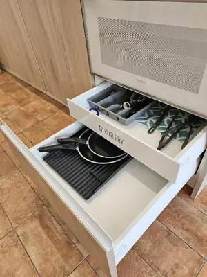 a drawer in a kitchen with utensils in it at Apartamentos Las Ciencias V in Valencia
