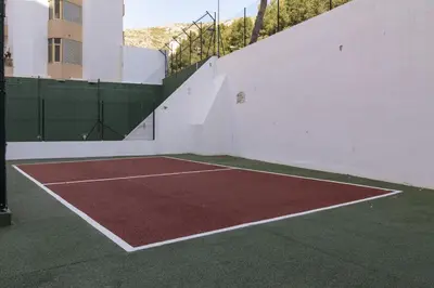 a tennis court in a building with a tennis at LAS VEGAS, esc-1, 7-14 in Cullera