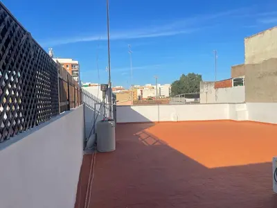 a view of a rooftop with a tennis court at UIM Mediterraneo Pablo Iglesias Wifi in Puerto de Sagunto