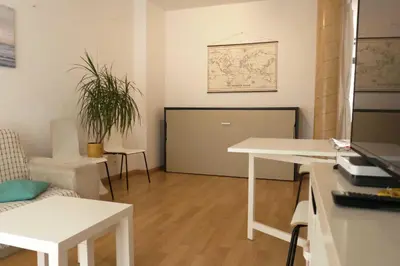 a living room with a couch and a table at Piso en el centro in Valencia