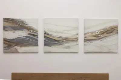 a group of three paintings hanging on a wall at Spacious OCEANOGRAFIC Flats Valencia in Valencia