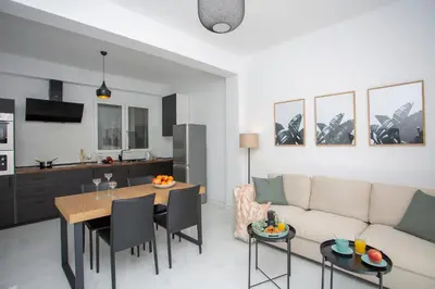 a living room with a couch and a table at SingularStays Tinglado in Valencia
