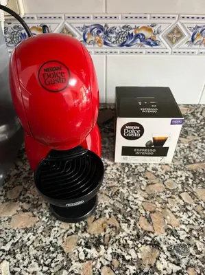a kitchen with a stove top with a pot on it at Playa Malvarrosa House in Valencia