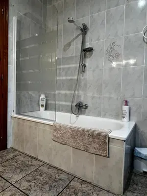a bathroom with a shower and a bath tub at Apartamento La Ermita in Chulilla