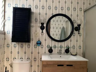 a bathroom with a sink and a mirror at Sagunto 2 in Sagunto