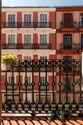 a building with a black fence in front of it at Loft Botanic Center in Valencia