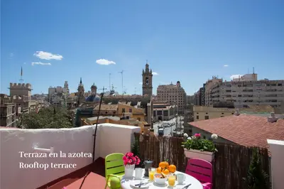 a balcony with a view of a city at Tossal in Valencia