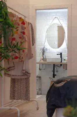 a bathroom with a sink and a mirror at RA - Stylish city loft - Walk to the best of Valencia in Valencia