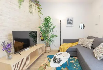 a living room with a couch and a fireplace at RB - Urban loft retreat, comfort & good location in Valencia