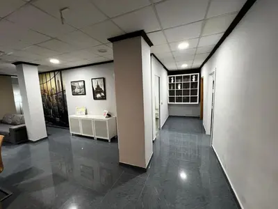 a hallway of an office with white walls at RMN TOURIST HOME in Valencia