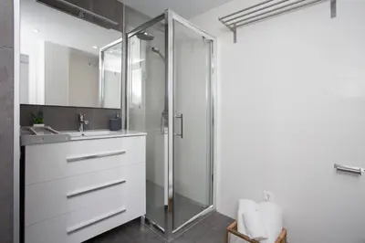 a bathroom with a shower and a sink at SingularStays Mercado Central in Valencia