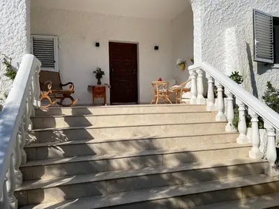 a set of stairs leading to a house at Chalet Las Brisas in Cullera