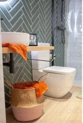 a bathroom with a white toilet and a sink at AL5 Seaside Bliss-stylish loft steps from Malvarrosa in Valencia