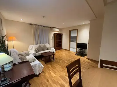 a living room with a couch and a table at Apartamento Almas Centro in Valencia