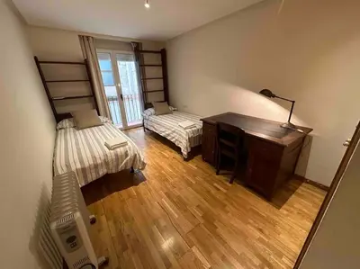 a room with a desk and a bed and a desk sidx sidx sidx at Apartamento Almas Centro in Valencia