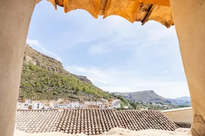 a view of a village from a window of a building at Casa la Baronia in Chulilla