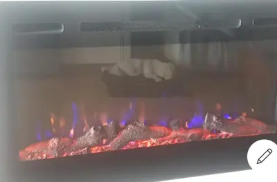 a bunch of meat cooking in an oven at Apartamento primerísima línea in Port Saplaya