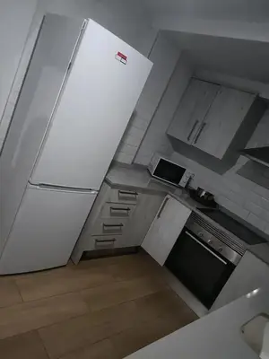 an overhead view of a kitchen with a refrigerator at vip rooms patraix in Valencia