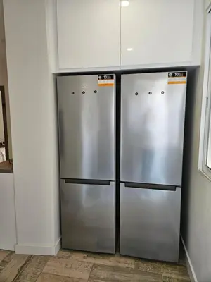 two stainless steel refrigerators are in a kitchen at Habitación céntrica de Lujo Gv 6 in Valencia