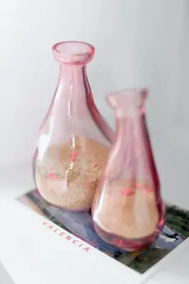 two glass vases sitting next to each other at Habitación céntrica de Lujo Gv 4 in Valencia