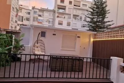a balcony with a bench and a building at Loft independiente de Lujo. in Valencia
