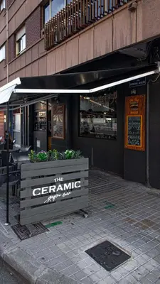 a restaurant with an awning in front of a building at ¡A disfrutar de Valencia! in Valencia