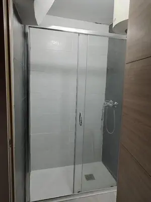 a shower with a glass door in a bathroom at kats chulilla in Chulilla