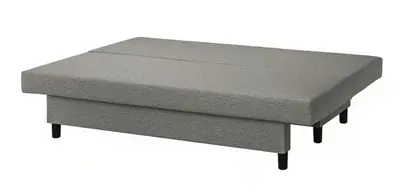 a gray ottoman with a storage drawer at lifecoliving valencia loft B in Valencia