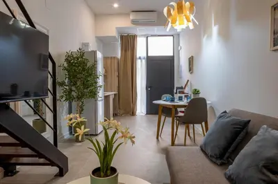 a living room with a couch and a table at Lore Loft Valencia in Valencia