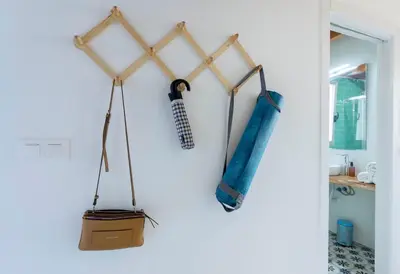a room with two baseball bats hanging on the wall at Mediterranean Gem Getaway in Valencia