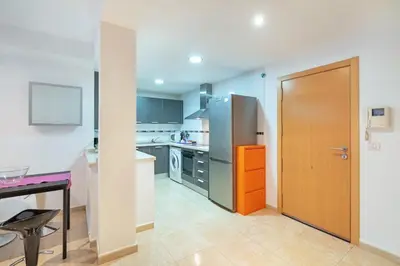 a kitchen with a white counter and a sink at El estudio de Inma in Burriana