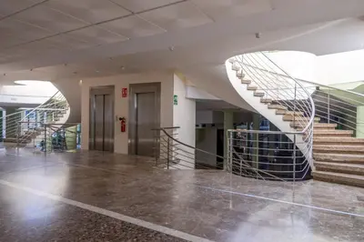 an empty lobby with stairs in a building at SAPORE DI MARE in Valencia