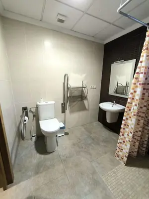 a bathroom with a toilet and a sink at Ca' La Conchin in Cortez de Pallas
