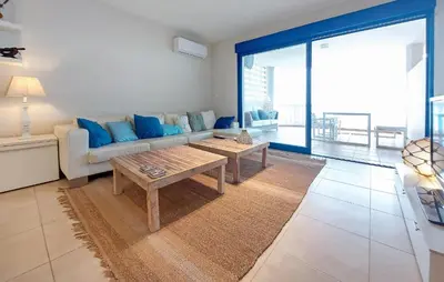 a living room with a couch and a coffee table at 2 Bedroom Awesome Apartment In Moncofa in Moncófar