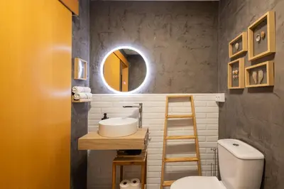 a bathroom with a sink and a mirror at FLORIT FLATS - The Pitiusas Rooms in Valencia