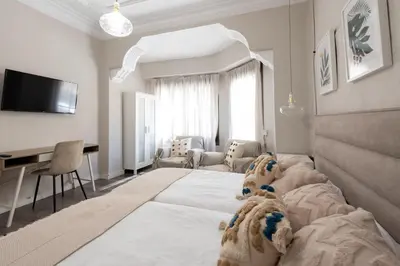 a bedroom with a dog laying on a bed at Nice lodging near the Plaza de Toros in Valencia