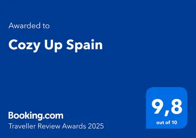 a blue square with the words cozy up spain on it at Cozy Up Spain in Valencia