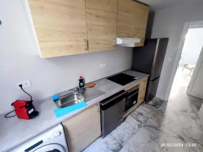 a small kitchen with a sink and a stove at Central Rooms - Valencia City Centre Boho-Cozy Downtown - VLC Urban Rental in Valencia