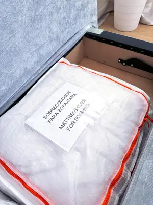a drawer with a box with a sign on it at Studio Aiora in Valencia