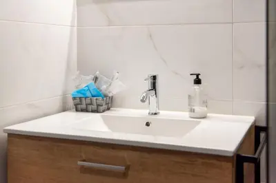 a white sink in a bathroom with a mirror at Precioso Loft Sorolla en Playa Malvarrosa/Patacona in Valencia