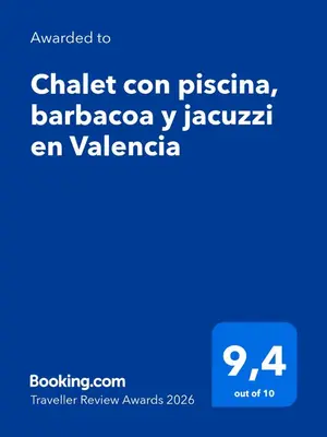 a screenshot of a cell phone with the text activated to chatelcoon pizza at Chalet con piscina, barbacoa y jacuzzi en Valencia in Turís
