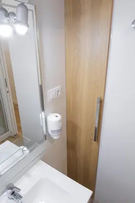 a bathroom with a sink and a mirror at Furio Silence in Valencia